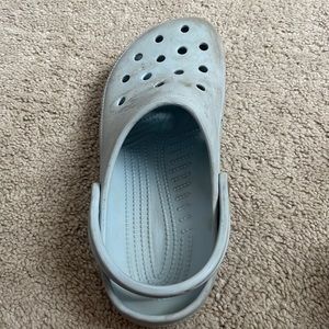 One singular light blue croc 6 men’s